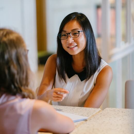 woman interviewing candidate