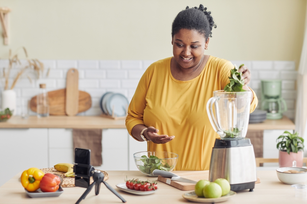 Woman making a smoothie