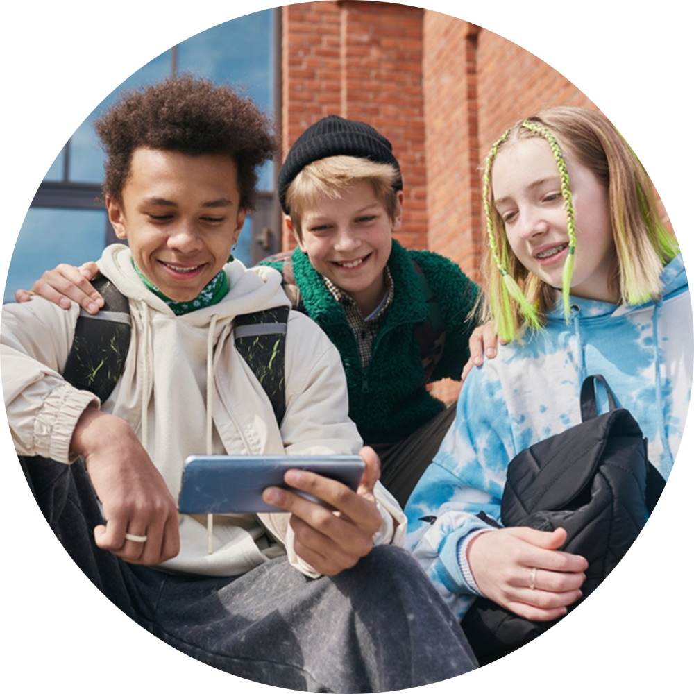 gen alpha kids looking at smartphone