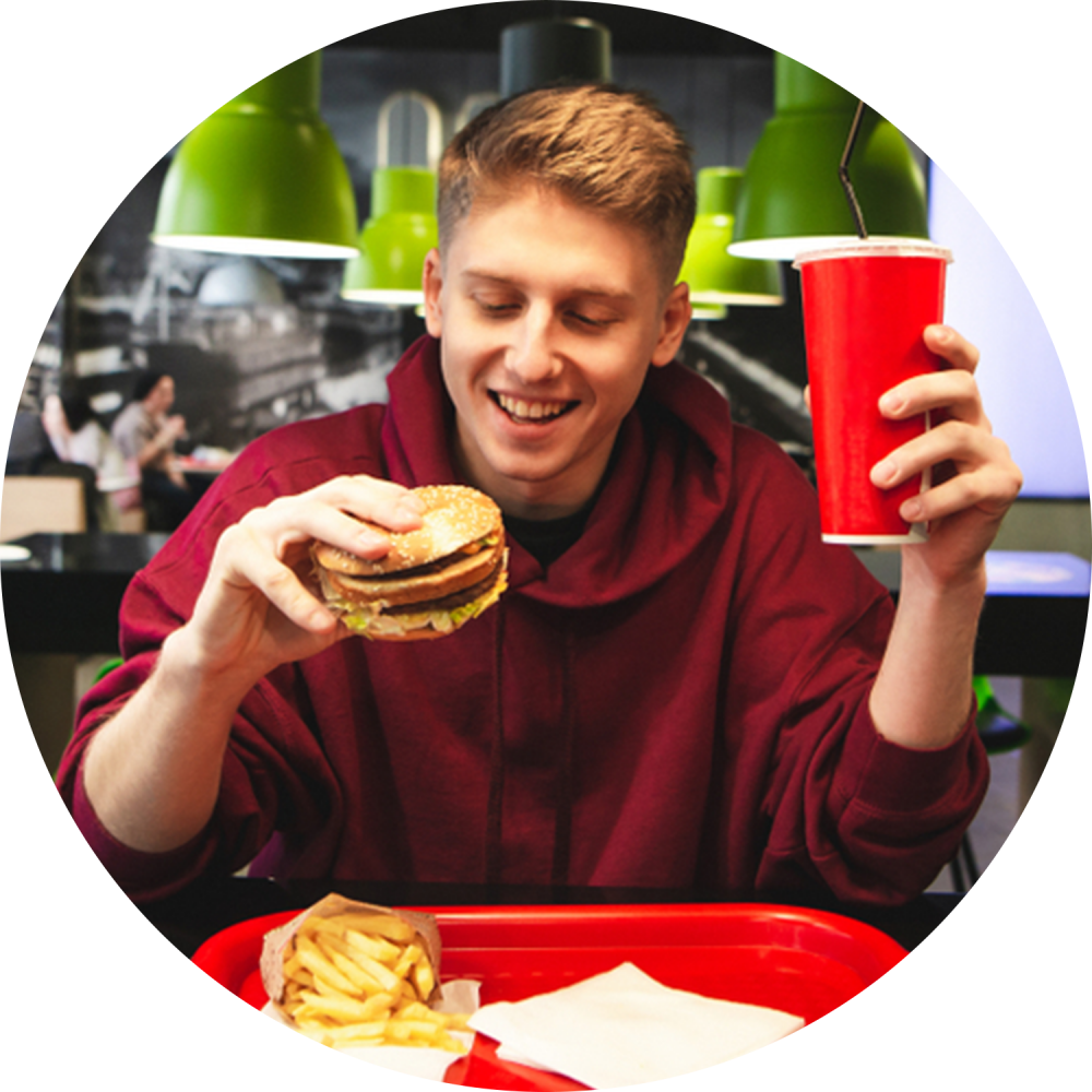 man eating QSR fast food meal