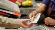 shopper-using-coupon shopper using coupon at checkout
