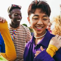 Young diverse people having fun at festival