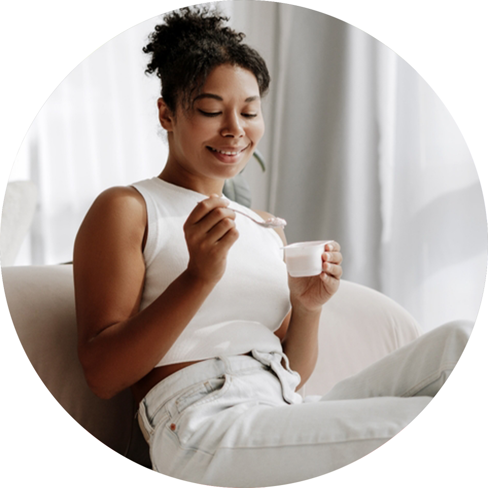 woman eating yogurt